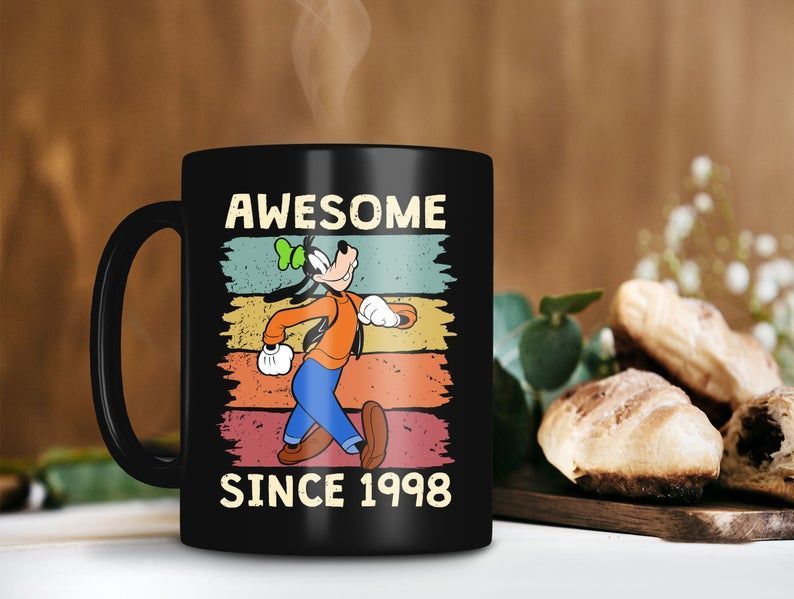 https://teeruto.com/wp-content/uploads/2022/04/goofy-awesome-since-1998-mug-customized-year-of-birth-mug-personalized-retro-vintage-disney-premium-sublime-ceramic-coffee-mug-blackvua1v.jpg