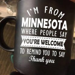 I’m From Minnesota Where People Say You’re Welcome To Remind You To Say Thank You Premium Sublime Ceramic Coffee Mug Black